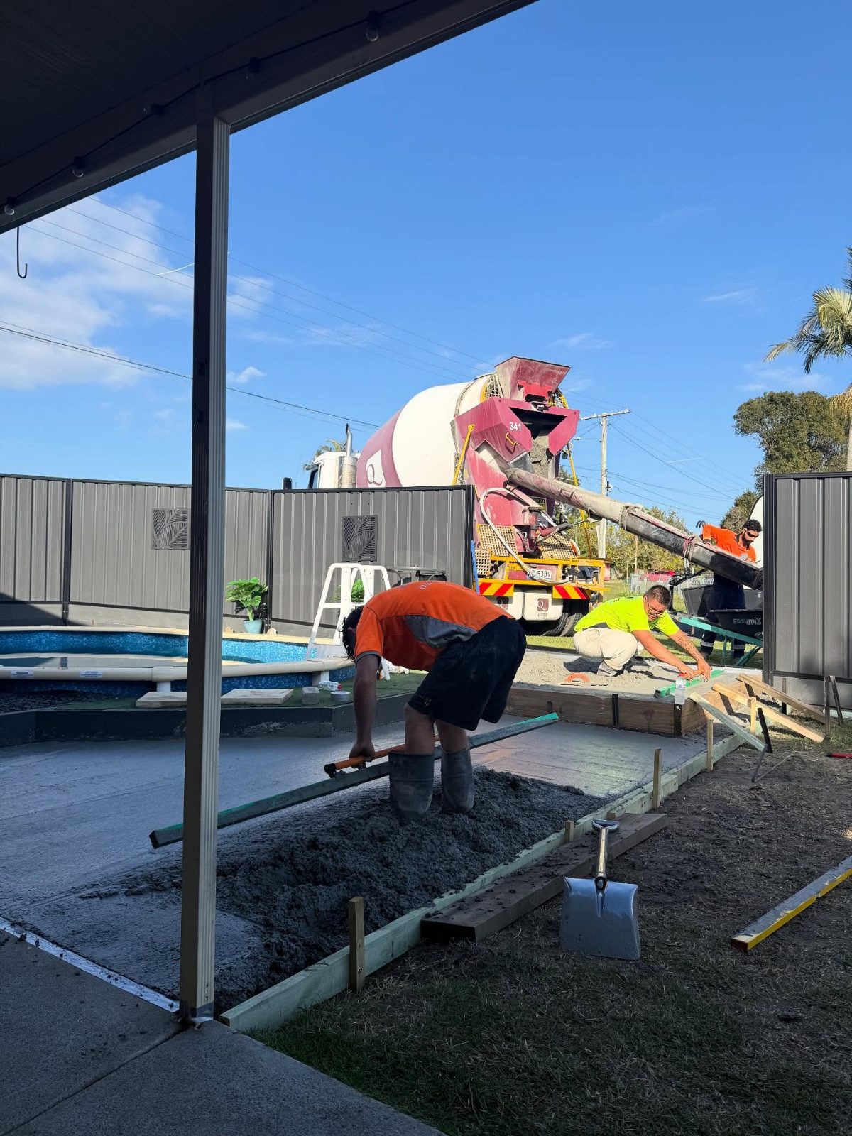 Screeding a Fresh Pour — Enhanced Concrete Services